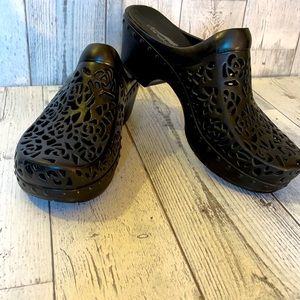 Dansko slip on clogs. Brand new never worn.